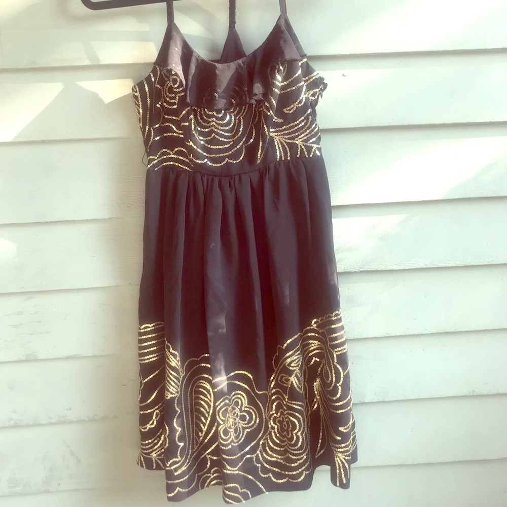 Black dress with gold accents